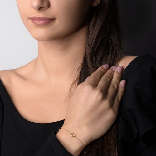 Bransoletka koło Savicki: złota, diament